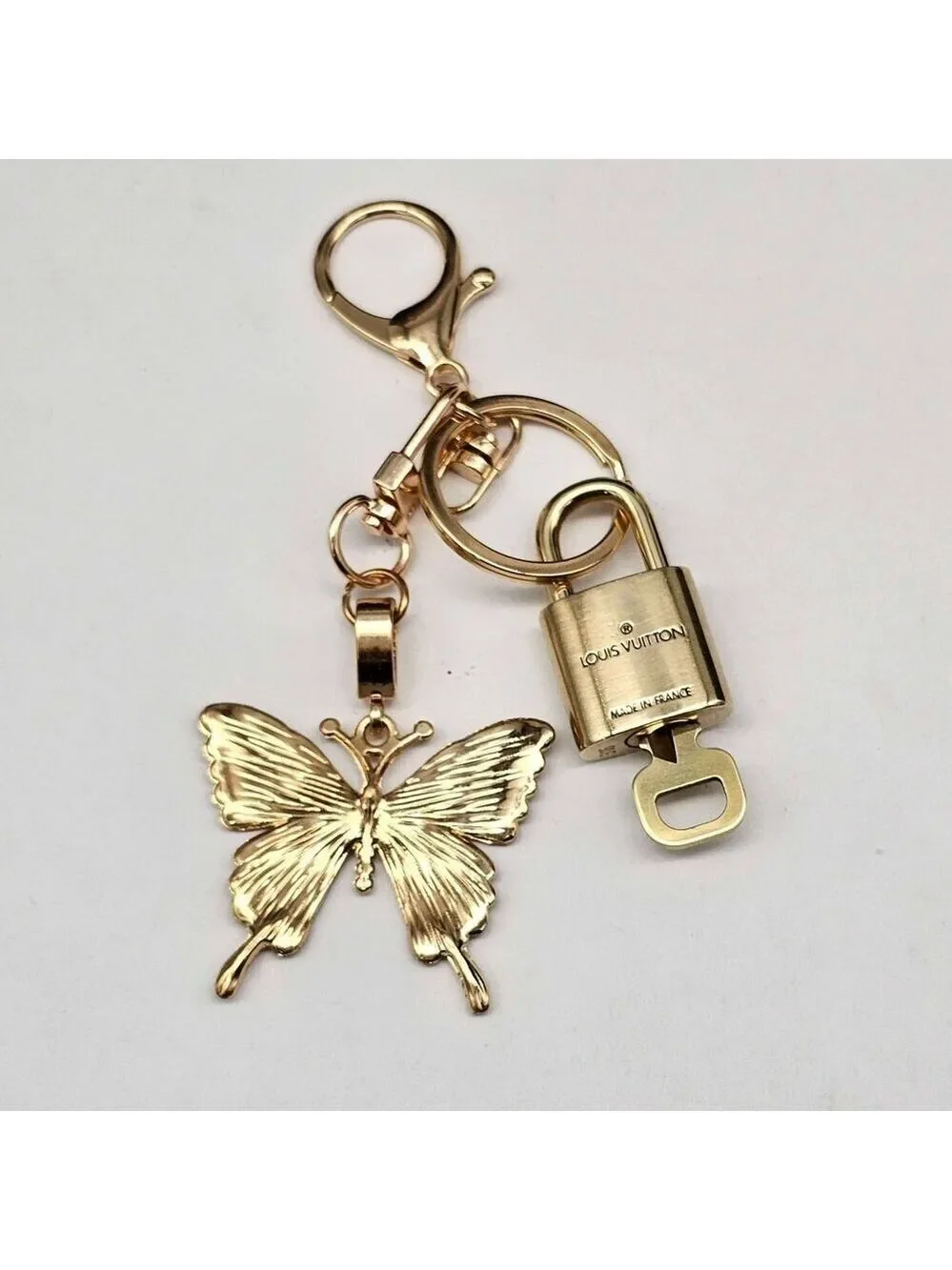 Louis Vuitton Authentic Gold Lock 🔒 Unbranded Butterfly Keychain for Bags